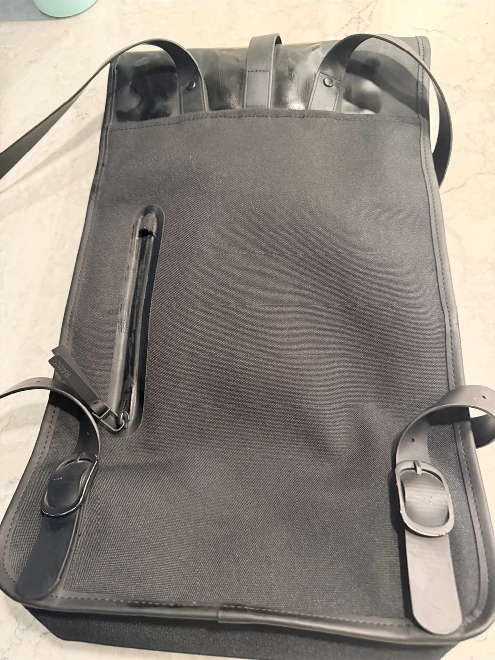 Rains Black Gloss Leather-Effect Men's Backpack with Strap Detail